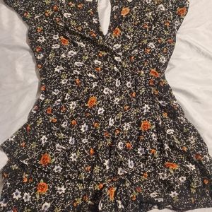 Romper size L runs small